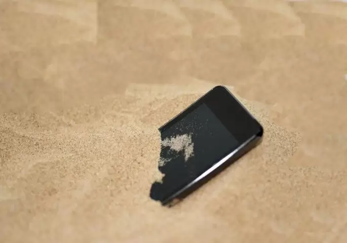 Pesak i telefon